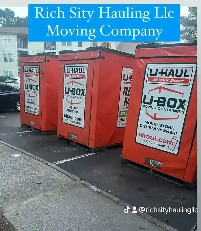 Three U-Haul U-Box moving containers loaded for a Rich Sity Hauling client in Richmond